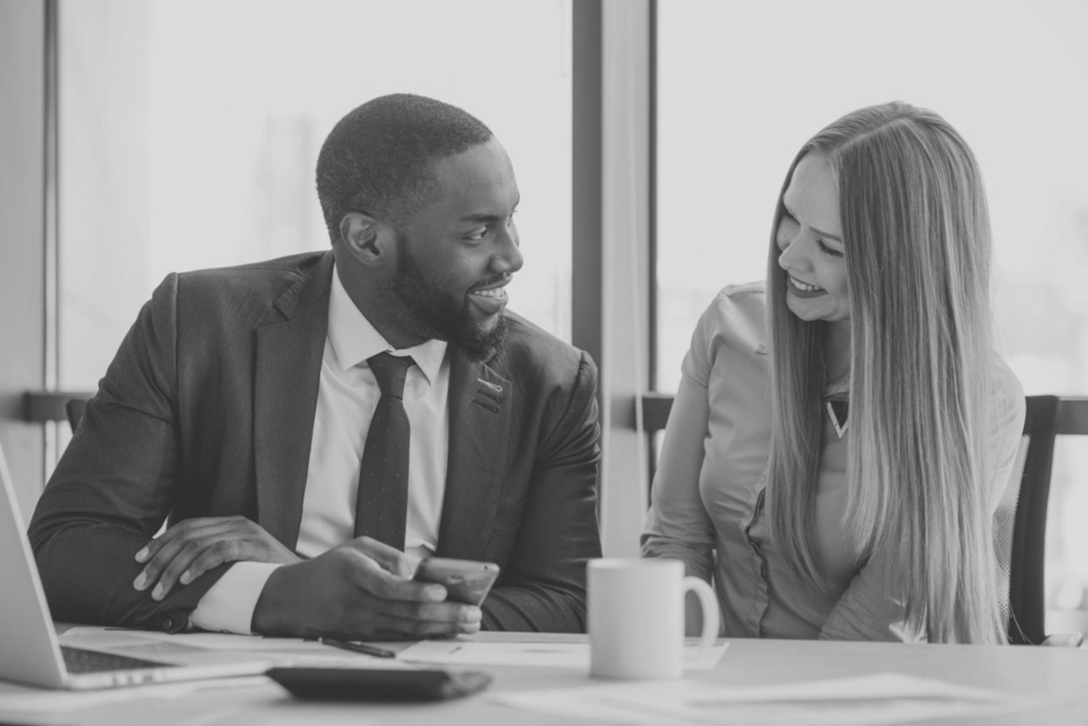 One-on-one business financial consultation showing personalized guidance and strategic planning